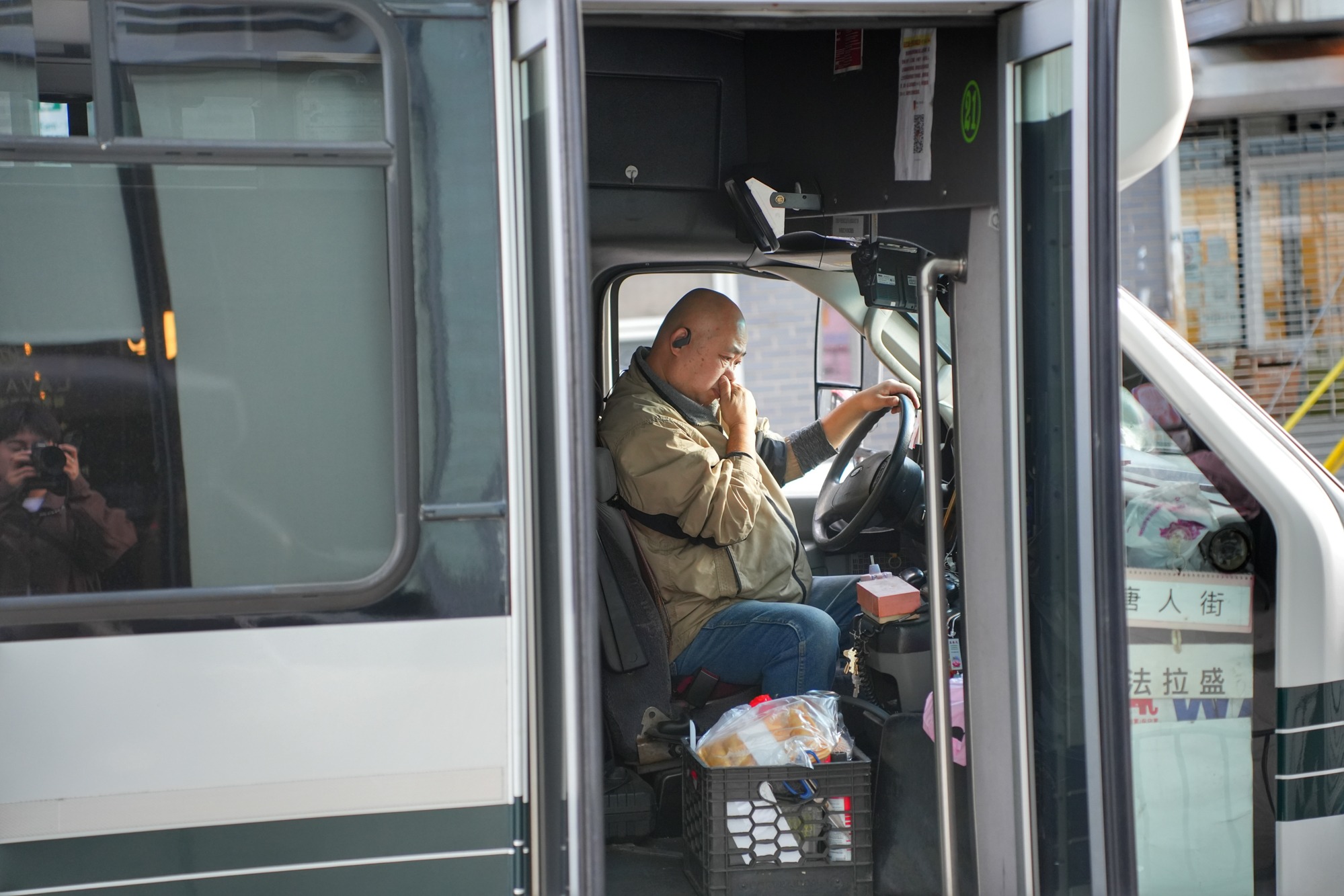 A driver prepares a shuttle connecting Chinatown and Flushing, two of New York’s largest Chinese communities. Nov. 8, 2025.